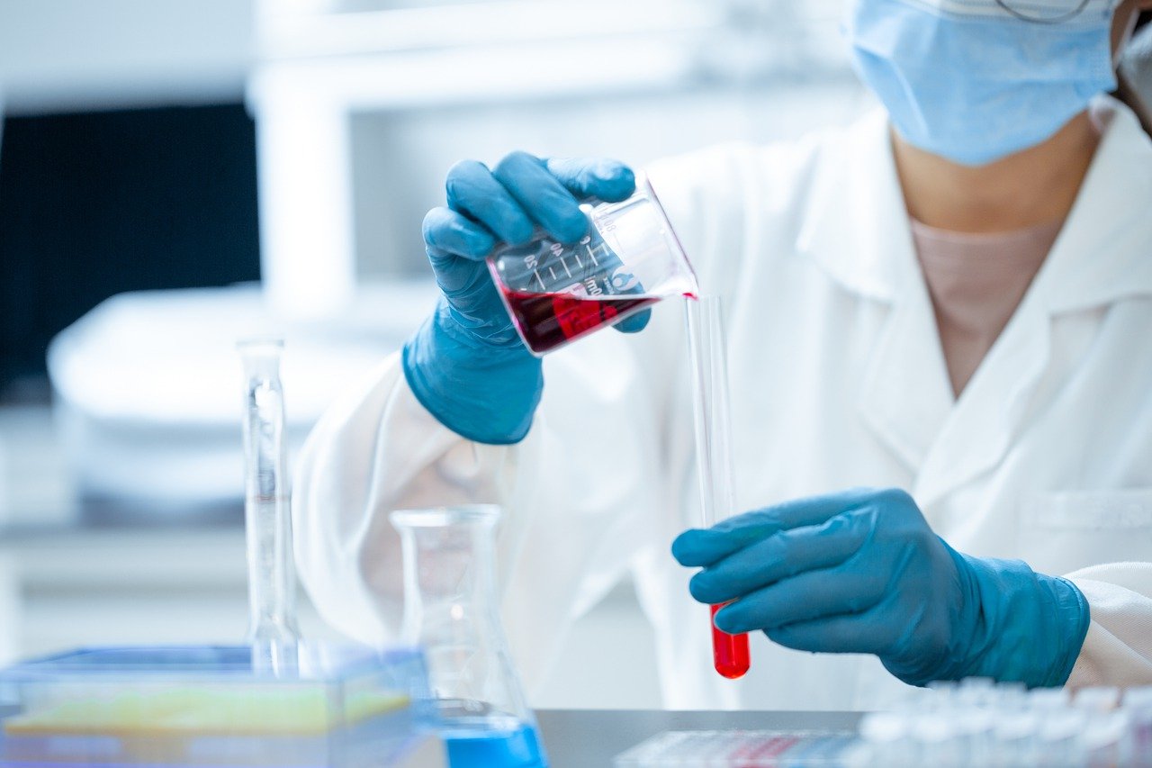 scientist in medical lab with test tube